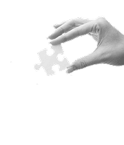 Right hand holding puzzle